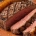 Brazilian Picanha am Spieß über offener Glut mit grobem Salz