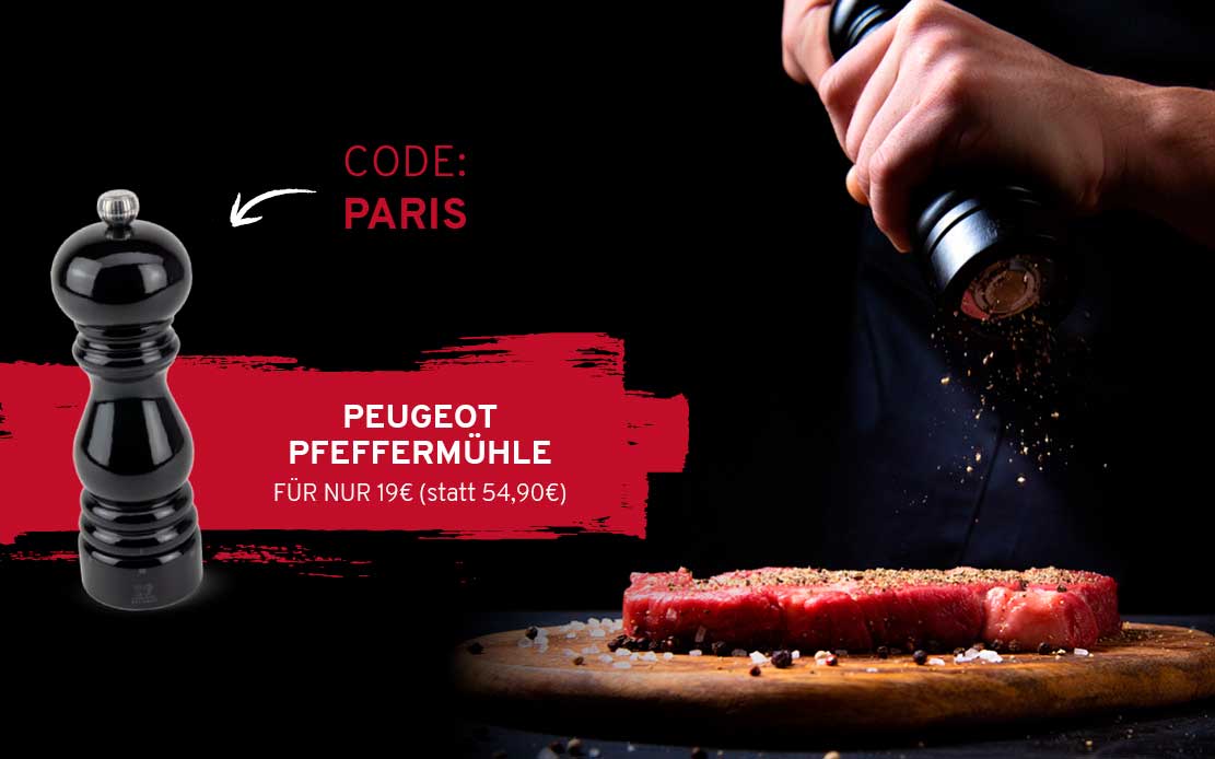 Schwarze Peugeot Pfeffermühle links, daneben eine Hand, die Pfeffer auf ein rohes Steak auf einem Holzbrett mahlt. Text: "CODE: PARIS" und "PEUGEOT PFEFFERMÜHLE FÜR NUR 19€ (statt 54,90€)".
